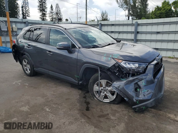2020 Toyota RAV4 XLE with VIN 2T3W1RFV1LC034366, listed as a Copart auction lot 61774875 with 77,335 mi miles and Salvage title. Bid and sale history available at DreamBid. Image 4.
