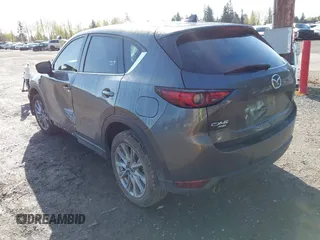 2019 Mazda CX-5 Grand Touring with VIN JM3KFBDM3K1677208, listed as a IAAI auction lot 41929299 with 58,163 mi miles. Bid and sale history available at carsss.com. Image 3.
