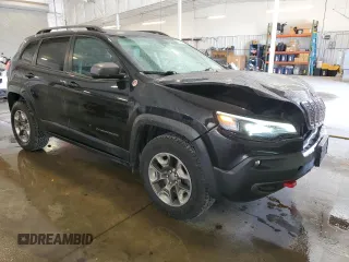 2019 Jeep Cherokee Trailhawk with VIN 1C4PJMBX1KD456551, listed as a Copart auction lot 58576065 with 121,259 mi miles and Salvage title. Bid and sale history available at DreamBid. Image 4.