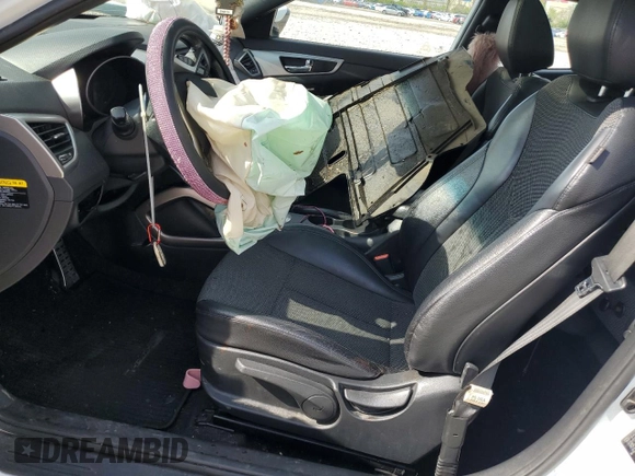 2016 Hyundai Veloster z VIN KMHTC6AD2GU272413, wystawiony jako Copart lot #55530805 z przebiegiem Nie podano mil oraz Szkoda całkowita • Salvage title. Historia ofert i sprzedaży dostępna na DreamBid. Obrazek 7.