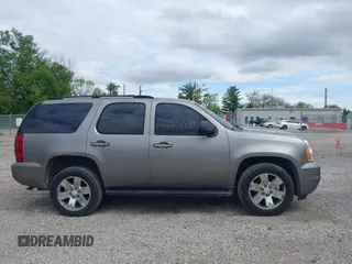 2007 GMC Yukon SLT z VIN 1GKFK13077R129885, wystawiony jako IAAI lot #42184207 z przebiegiem 264 848 mil mil oraz . Historia ofert i sprzedaży dostępna na DreamBid. Obrazek 13.