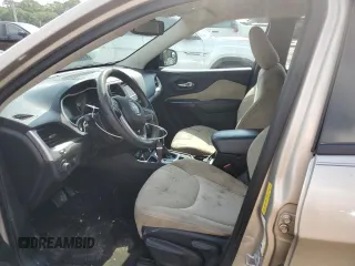 2015 Jeep Cherokee Sport z VIN 1C4PJLAB9FW547402, wystawiony jako Copart lot #53164885 z przebiegiem 128 717 mil mil oraz Szkoda całkowita • Salvage title. Historia ofert i sprzedaży dostępna na DreamBid. Obrazek 7.