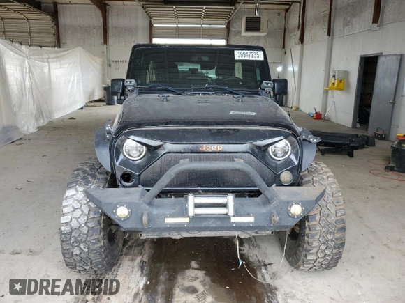 2012 Jeep Wrangler Unlimited Sahara with VIN 1C4BJWEG3CL195271, listed as a Copart auction lot 59947235 with 212,819 mi miles and Salvage title. Bid and sale history available at DreamBid. Image 5.