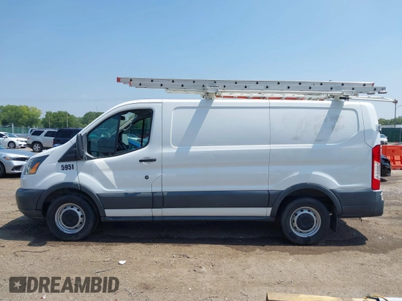 2016 Ford Transit Cargo with VIN 1FTYE1ZM1GKB27189, listed as a IAAI auction lot 40110239 with 131,106 mi miles and . Bid and sale history available at carsss.com. Image 14.