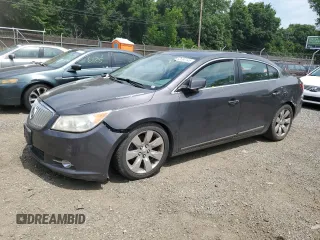 2012 Buick LaCrosse Premium 2 z VIN 1G4GF5E38CF266828, wystawiony jako Copart lot #62690145 z przebiegiem 163 286 mil mil oraz Szkoda całkowita • Salvage title. Historia ofert i sprzedaży dostępna na DreamBid. Obrazek 1.