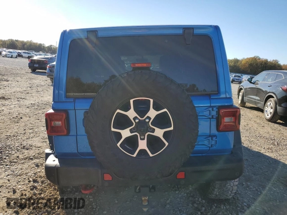 2022 Jeep Wrangler Unlimited Rubicon with VIN 1C4HJXFG5NW217688, listed as a Copart auction lot 81182824 with 63,102 mi miles and Salvage title. Bid and sale history available at DreamBid. Image 6.