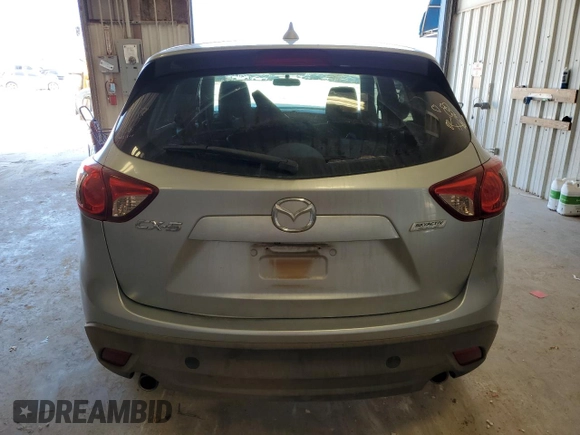 2016 Mazda CX-5 Touring with VIN JM3KE2CY0G0771566, listed as a Copart auction lot 52688255 with 142,204 mi miles and Salvage Title. Bid and sale history available at carsss.com. Image 6.