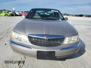 1999 Lincoln Continental with VIN 1LNHM97V8XY671775, listed as a Copart auction lot 42429965 with 79,851 mi miles and Clean Title. Bid and sale history available at carsss.com. Image 5.