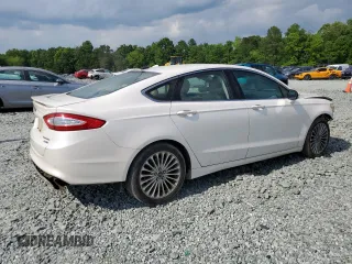 2016 Ford Fusion Titanium with VIN 3FA6P0D90GR286625, listed as a Copart auction lot 57216665 with 173,100 mi miles and Salvage title. Bid and sale history available at DreamBid. Image 3.