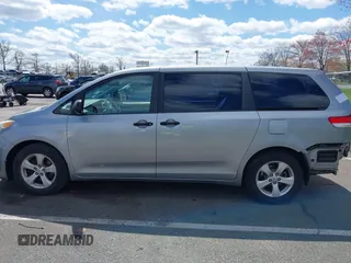 2013 Toyota Sienna L with VIN 5TDZK3DC9DS298333, listed as a IAAI auction lot 41941011 with 141,021 mi miles. Bid and sale history available at carsss.com. Image 14.