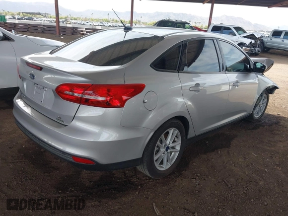 2018 Ford Focus SE with VIN 1FADP3FE7JL271029, listed as a IAAI auction lot 41922961 with 86,578 mi miles. Bid and sale history available at carsss.com. Image 4.