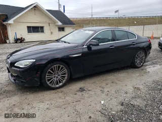 2016 BMW 6 Series 650i xDrive with VIN WBA6D6C52GG388050, listed as a Copart auction lot 50798175 with 94,165 mi miles and Salvage Title. Bid and sale history available at carsss.com. Image 1.