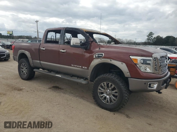 2016 Nissan Titan Pro-4X with VIN 1N6BA1F44GN509914, listed as a Copart auction lot 44417905 with Not provided miles and Salvage title. Bid and sale history available at DreamBid. Image 4.