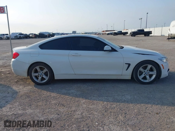 2015 BMW 4 Series 428i z VIN WBA3N7C58FK224500, wystawiony jako IAAI lot #42044727 z przebiegiem 71 815 mil mil oraz . Historia ofert i sprzedaży dostępna na DreamBid. Obrazek 13.