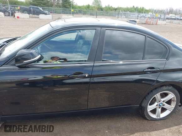 2014 BMW 3 Series 328i xDrive with VIN WBA3B3C58EJ982424, listed as a IAAI auction lot 42075568 with 190,009 mi miles. Bid and sale history available at carsss.com. Image 14.