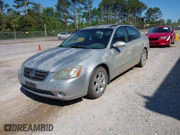 2002 Nissan Altima S with VIN 1N4AL11D12C166490, listed as a IAAI auction lot 42056634 with 203,367 mi miles. Bid and sale history available at carsss.com. Image 2.