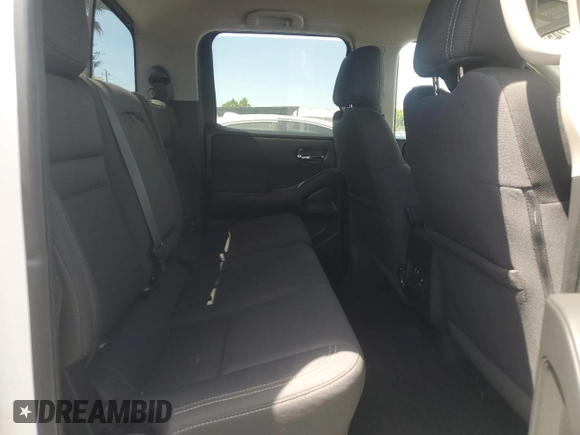 2022 Nissan Frontier Pro-4X with VIN 1N6ED1EKXNN674402, listed as a Copart auction lot 57417245 with 13,986 mi miles and Salvage title. Bid and sale history available at DreamBid. Image 10.