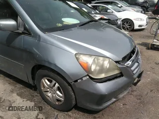 2006 Honda Odyssey EX-L with VIN 5FNRL38706B107724, listed as a IAAI auction lot 39245592 with 186,885 mi miles. Bid and sale history available at carsss.com. Image 6.