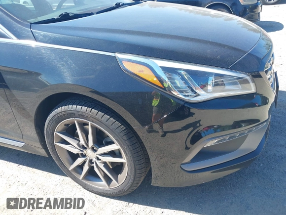 2015 Hyundai Sonata Sport z VIN 5NPE34AB5FH198560, wystawiony jako IAAI lot #42467031 z przebiegiem 96 111 mil mil oraz . Historia ofert i sprzedaży dostępna na DreamBid. Obrazek 6.