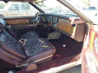 1985 Cadillac Eldorado with VIN 1G6EL5786FE637155, listed as a IAAI auction lot 41855514 with 71,863 mi miles. Bid and sale history available at carsss.com. Image 5.