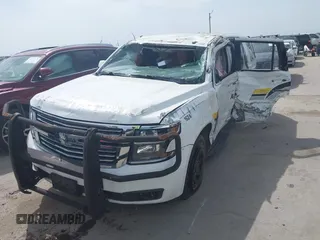 2016 Chevrolet Tahoe Commercial z VIN 1GNLCDEC9GR299693, wystawiony jako IAAI lot #42630221 z przebiegiem 127 081 mil mil oraz . Historia ofert i sprzedaży dostępna na DreamBid. Obrazek 2.