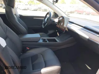 2023 Tesla Model Y Long Range with VIN 7SAYGDEE0PA111430, listed as a IAAI auction lot 42156924 with 35,950 mi miles and . Bid and sale history available at DreamBid. Image 5.