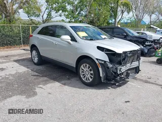 2019 Cadillac XT5 FWD with VIN 1GYKNARSXKZ242727, listed as a IAAI auction lot 41669220 with 62,812 mi miles and . Bid and sale history available at carsss.com. Image 1.