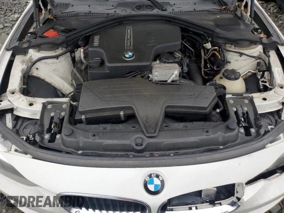 2014 BMW 3 Series 320i xDrive with VIN WBA3C3C51EF983592, listed as a Copart auction lot 60608765 with 195,061 mi miles and Salvage title. Bid and sale history available at DreamBid. Image 11.
