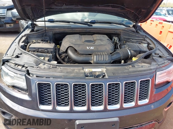 2015 Jeep Grand Cherokee Overland with VIN 1C4RJFCG6FC831641, listed as a IAAI auction lot 41877680 with 143,568 mi miles. Bid and sale history available at carsss.com. Image 10.