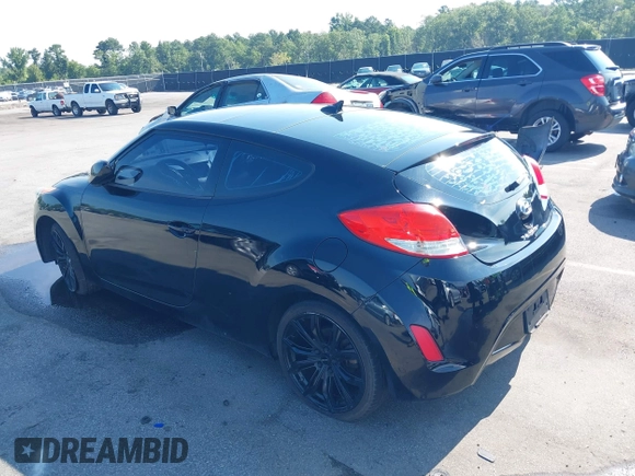 2012 Hyundai Veloster w/Black Int z VIN KMHTC6AD4CU078413, wystawiony jako IAAI lot #42611032 z przebiegiem 142 295 mil mil oraz . Historia ofert i sprzedaży dostępna na DreamBid. Obrazek 3.