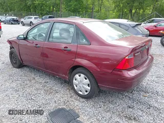 2007 Ford Focus S with VIN 1FAFP34N47W309478, listed as a IAAI auction lot 42541785 with 129,436 mi miles and . Bid and sale history available at DreamBid. Image 3.