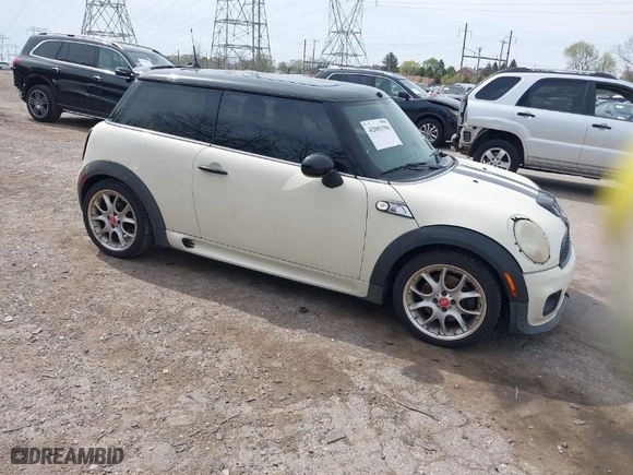 2008 MINI Cooper Hardtop S with VIN WMWMF73578TV33406, listed as a IAAI auction lot 42081596 with 120,183 mi miles. Bid and sale history available at carsss.com. Image 1.