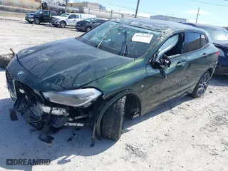 2023 BMW X2 sDrive28i with VIN WBXYH9C03P5V36629, listed as a IAAI auction lot 41669184 with 1 mi miles. Bid and sale history available at carsss.com. Image 2.