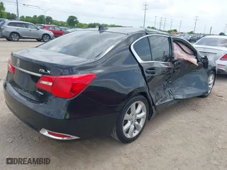 2014 Acura RLX with VIN JH4KC1F36EC002427, listed as a IAAI auction lot 42099583 with 114,671 mi miles. Bid and sale history available at carsss.com. Image 4.
