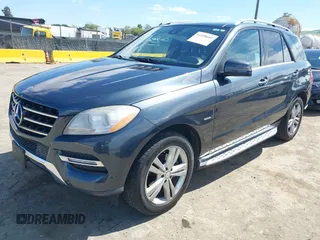 2012 Mercedes-Benz M ML 350 with VIN 4JGDA5HB6CA044757, listed as a IAAI auction lot 41858601 with 135,943 mi miles. Bid and sale history available at carsss.com. Image 18.