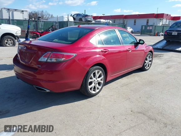 2009 Mazda 6 S Grand Touring with VIN 1YVHP82B495M13805, listed as a IAAI auction lot 41595504 with 156,432 mi miles and . Bid and sale history available at DreamBid. Image 4.
