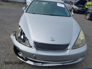 2005 Lexus ES 350 z VIN JTHBA30G555068789, wystawiony jako IAAI lot #42412848 z przebiegiem 100 430 mil mil oraz . Historia ofert i sprzedaży dostępna na DreamBid. Obrazek 13.