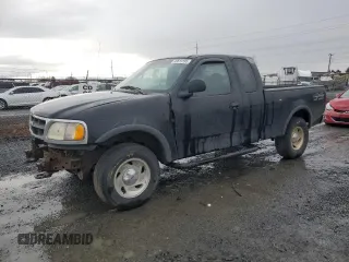 1997 Ford F-150 XL with VIN 1FTDX1867VKB03147, listed as a Copart auction lot 49814195 with 224,515 mi miles and Salvage title. Bid and sale history available at DreamBid. Image 1.