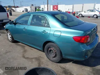 2009 Toyota Corolla with VIN JTDBL40E69J011255, listed as a IAAI auction lot 41549353 with 64,308 mi miles. Bid and sale history available at carsss.com. Image 3.