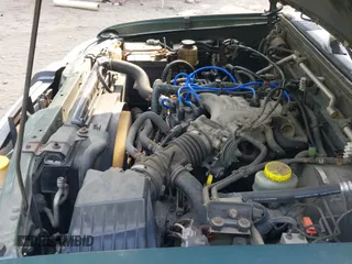 2002 Nissan Frontier XE with VIN 1N6ED29Y12C350508, listed as a IAAI auction lot 42690015 with 287,759 mi miles and . Bid and sale history available at DreamBid. Image 12.