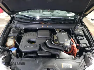 2013 Lincoln MKZ Hybrid z VIN 3LN6L2LU7DR823358, wystawiony jako Copart lot #51864445 z przebiegiem 112 531 mil mil oraz Szkoda całkowita • Salvage title. Historia ofert i sprzedaży dostępna na DreamBid. Obrazek 11.