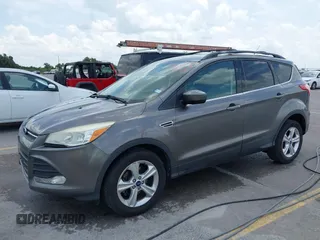 2013 Ford Escape SE with VIN 1FMCU0GX7DUD94269, listed as a IAAI auction lot 42621776 with 116,117 mi miles and . Bid and sale history available at DreamBid. Image 2.