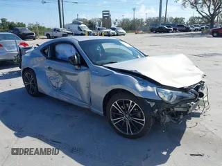 2013 Scion FR-S with VIN JF1ZNAA17D2728856, listed as a IAAI auction lot 41617183 with 116,711 mi miles. Bid and sale history available at carsss.com. Image 1.