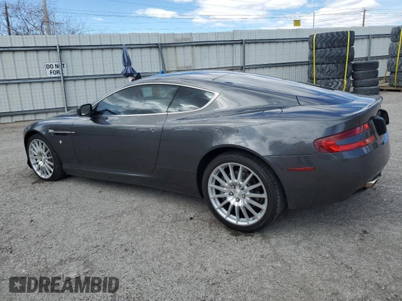 2007 Aston Martin DB9 z VIN SCFAD01A77GA07808, wystawiony jako Copart lot #48063115 z przebiegiem 53 195 mil mil oraz Szkody całkowita. Historia ofert i sprzedaży dostępna na DreamBid. Obrazek 2.