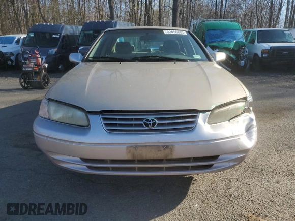 1999 Toyota Camry LE z VIN JT2BF22K4X0199123, wystawiony jako Copart lot #53456665 z przebiegiem 181 526 mil mil oraz Szkoda całkowita • Salvage title. Historia ofert i sprzedaży dostępna na DreamBid. Obrazek 5.