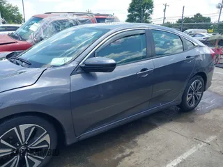 2016 Honda Civic EX-L with VIN 19XFC1F77GE201469, listed as a IAAI auction lot 42441617 with 67,803 mi miles and . Bid and sale history available at DreamBid. Image 14.