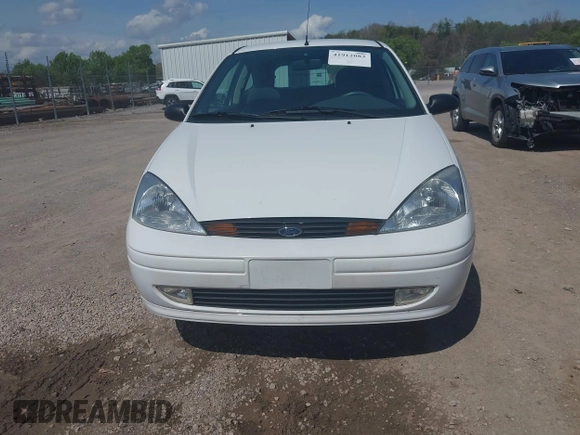 2001 Ford Focus ZX3 z VIN 3FAFP31381R210045, wystawiony jako IAAI lot #41912083 z przebiegiem 52 931 mil mil oraz . Historia ofert i sprzedaży dostępna na DreamBid. Obrazek 6.