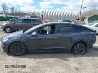 2023 Tesla Model X with VIN 7SAXCDE52PF425834, listed as a IAAI auction lot 41996298 with Not Provided miles and . Bid and sale history available at DreamBid. Image 13.
