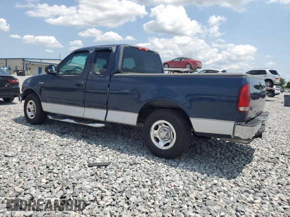 2002 Ford F-150 XL with VIN 1FTRX17222KB05081, listed as a Copart auction lot 56459765 with 126,941 mi miles and Salvage title. Bid and sale history available at DreamBid. Image 2.
