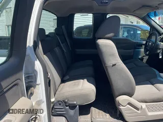 2009 Ford F-150 STX with VIN 1FTRX12879FA71573, listed as a Copart auction lot 56188705 with 228,051 mi miles and Clean Title. Bid and sale history available at DreamBid. Image 6.